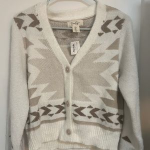 Beautiful Medium Jessica Simpson sweater for all occasions. Great fit.